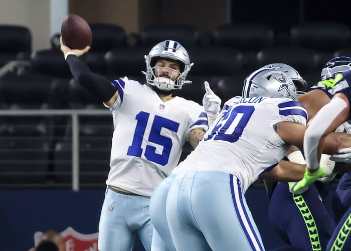 Aug 26, 2022; Arlington, Texas, USA; Dallas Cowboys quarterback Will Grier (15) throws during the first quarter Seattle Seahawks at AT&T Stadium.